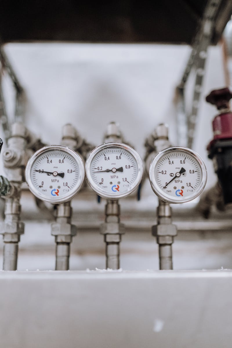 Plumbing pressure gauge and valve close-up